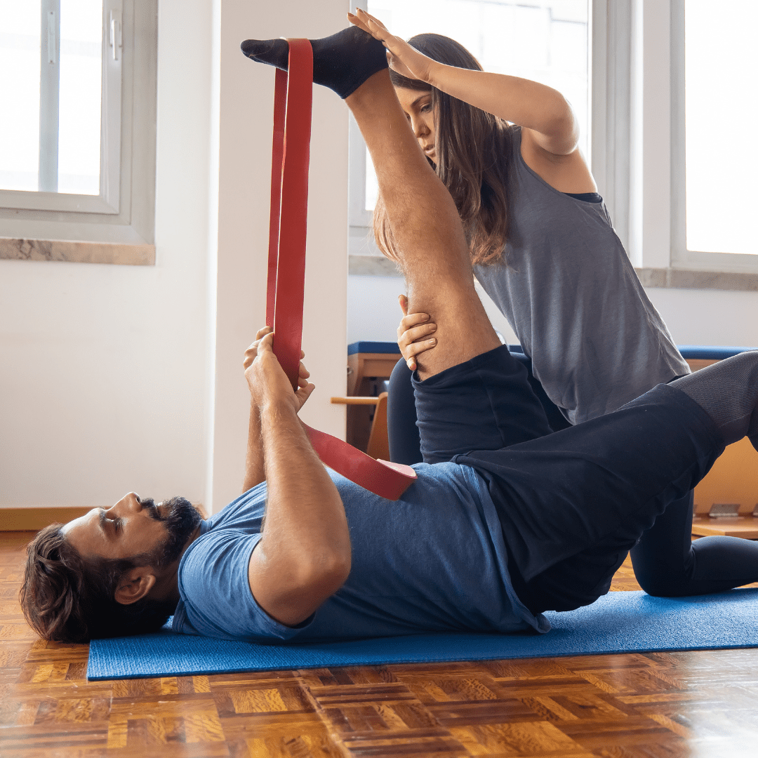 Men demonstrating wrestling combat moves